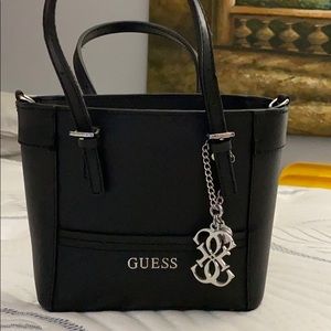 Guess small hand bag. Used 2x.  Black